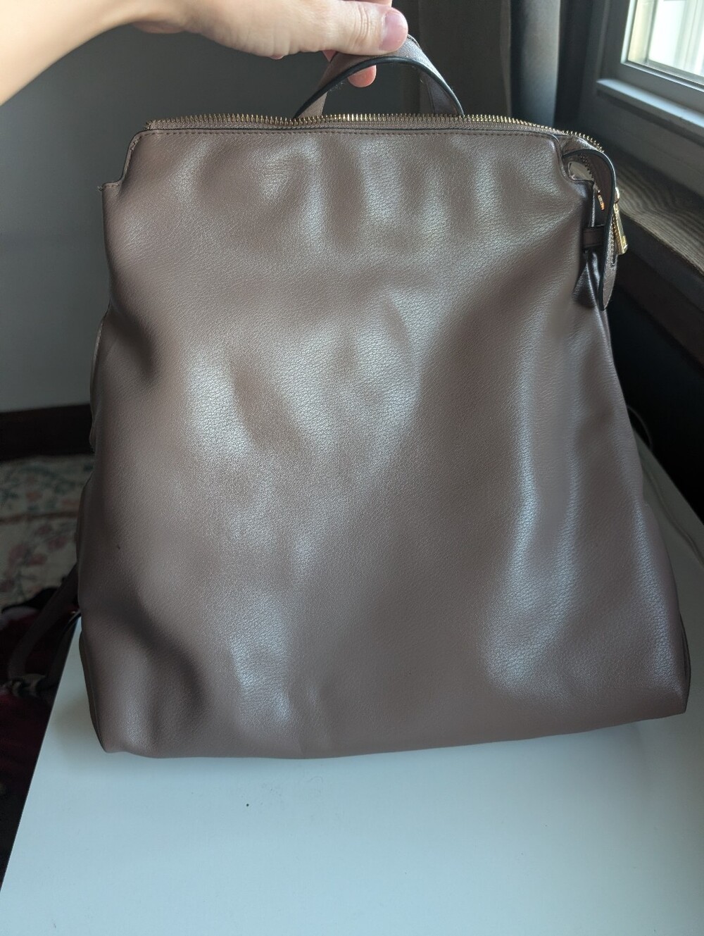 Sleek Brown Leather Top-Handle Backpack